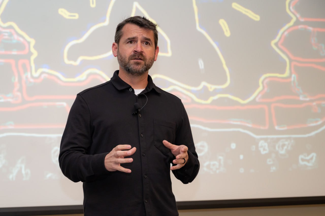 Aaron Stone speaks at the 103rd Airlift Wing Bradley Air National Guard Base in Connecticut